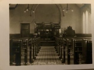 Settle Interior of Settle Primitive Methodist Chapel. Notice the Edwardian pulpit to the side. | Postcard from collection of Revd Steven Wild