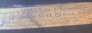 Inscription on the clock presented to Mr AH Iles, organist of Clowes Primitive Methodist chapel, Bristol, by  the Choir