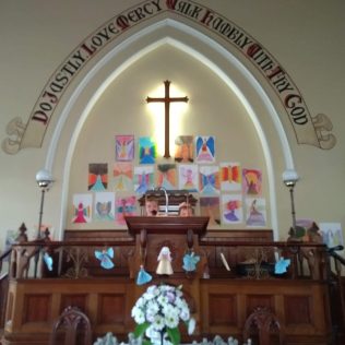 Brother and Sister having great time - church decorated for Open Gardens day - 15 June 2019 | Kym Maxwell-Perrin