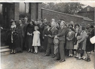 Significant event at Heather Primitive Methodist chapel. Enid Cooper is the girl in the White dress. Significant event at Heather Primitive Methodist chapel. Enid Cooper is the girl in the White dress. | with kind permission of the Ibstock Historical Society; copyright remains with the original donor