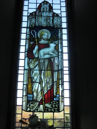 One of the stained glass windows at the back of the chapel