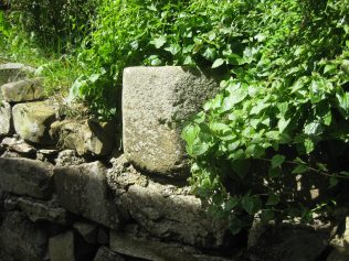 Font used in the chapel when open, now used as a wall decoration