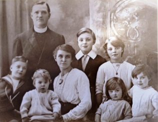 The Goodreid Family c1920.  Dorothy(our mother) is in back row right; Phoebe, 100 later this year (2016), is bottom row second from left | Family photograph