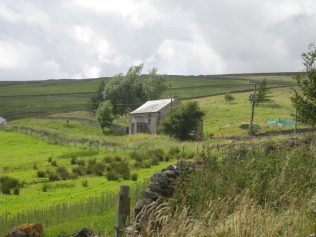 Photo of Swinhope Chapel in the distance