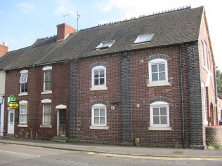 Side view of chapel and two small cottages which may have been built at the same time Side view of chapel and two small cottages which may have been built at the same time
