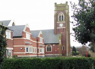 Church with new building replacing school to the side | Christopher Hill 2015